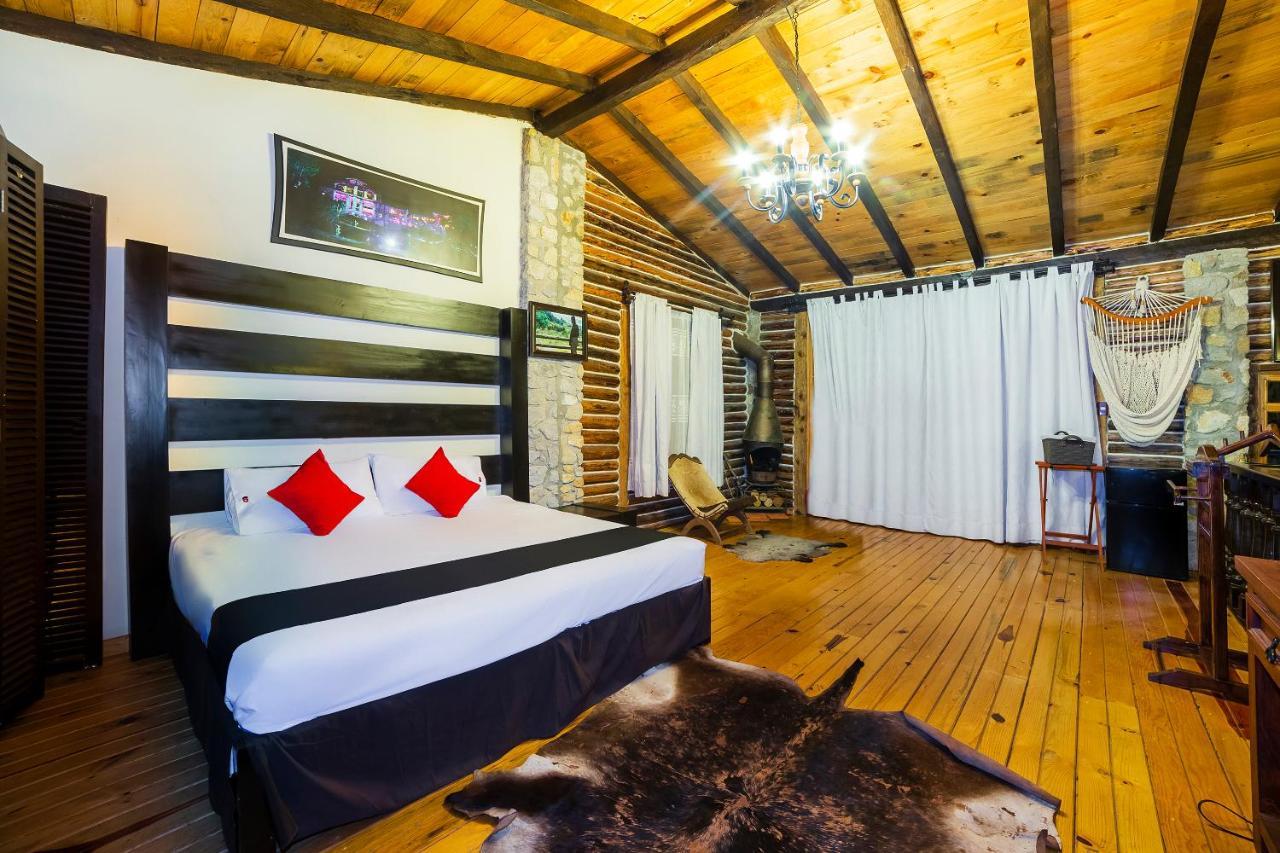 Capital O Cabanas Y Hotel El Rincon Zacatlán 外观 照片